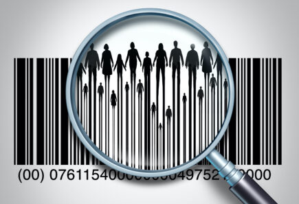 Magnifying glass on barcode showing people silhouettes