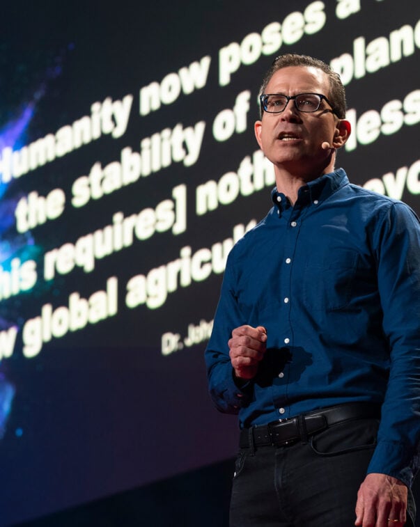 Bruce friedrich on stage during a ted talk presentation